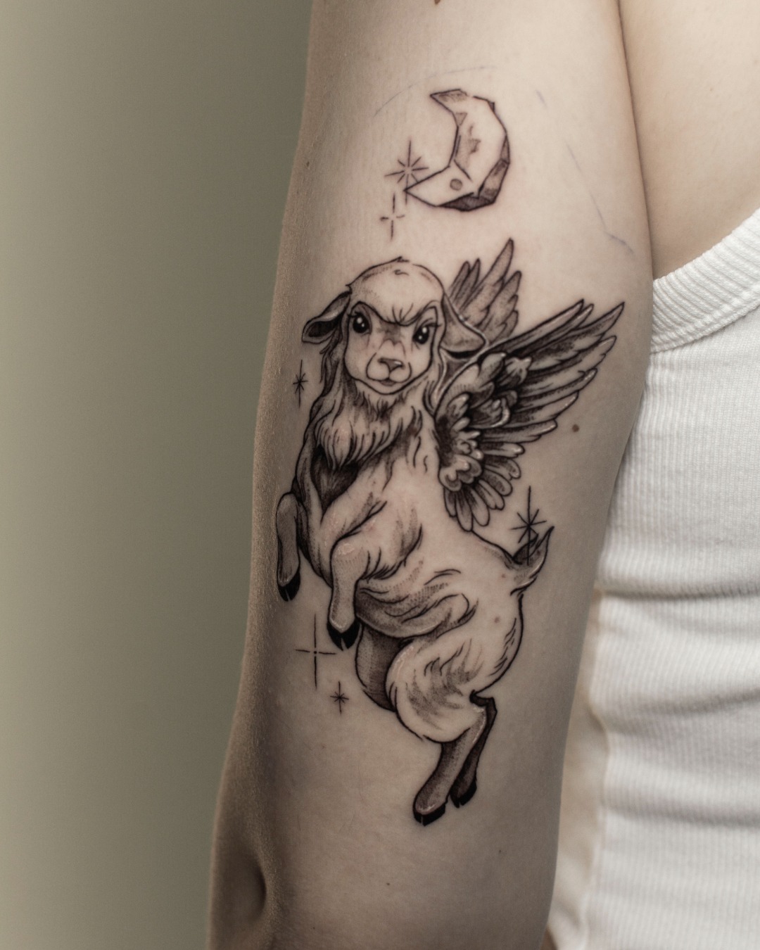 Winged Lamb Under Crescent Moon