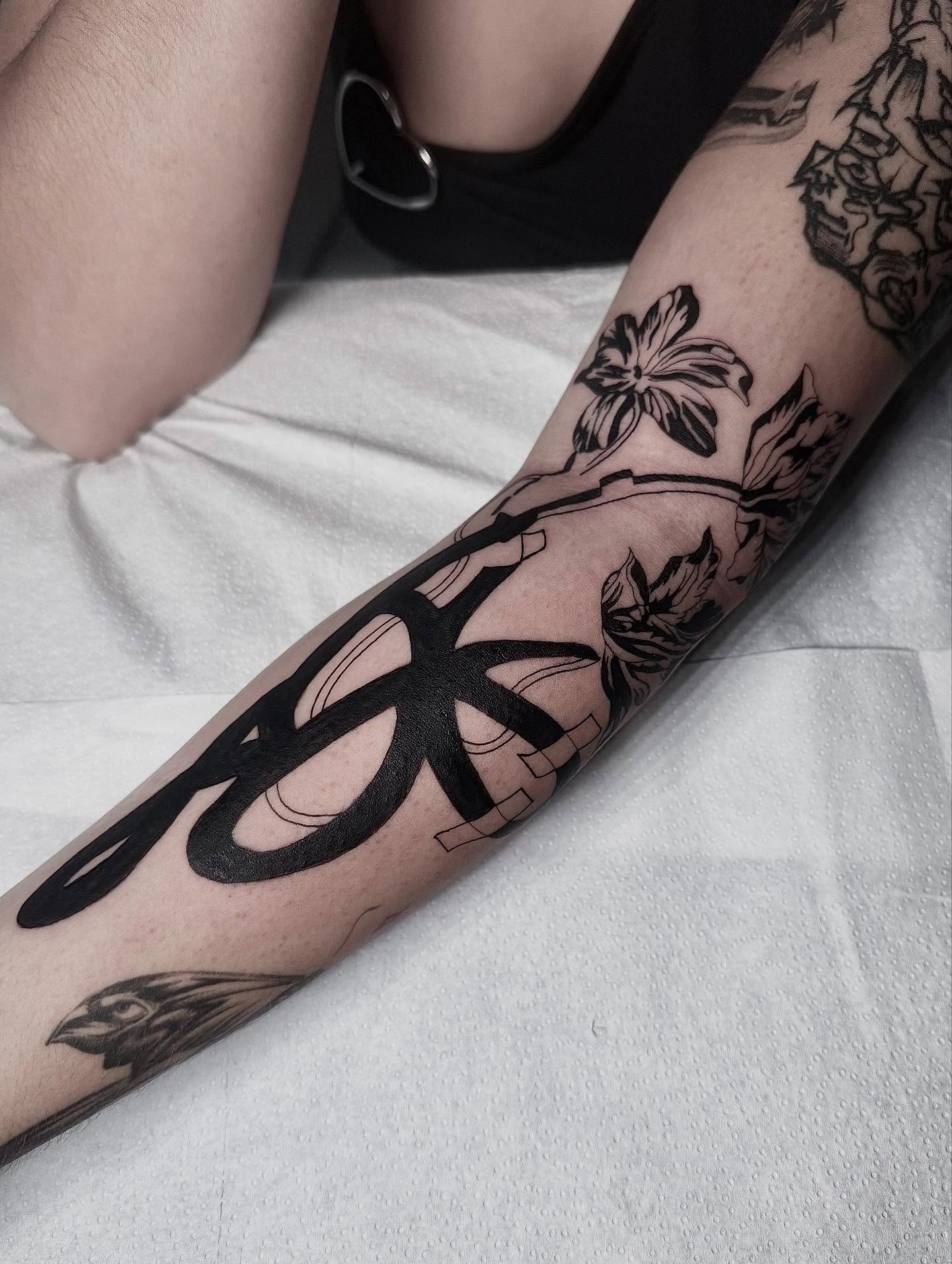 Blackwork Floral Sleeve with Bold Lettering