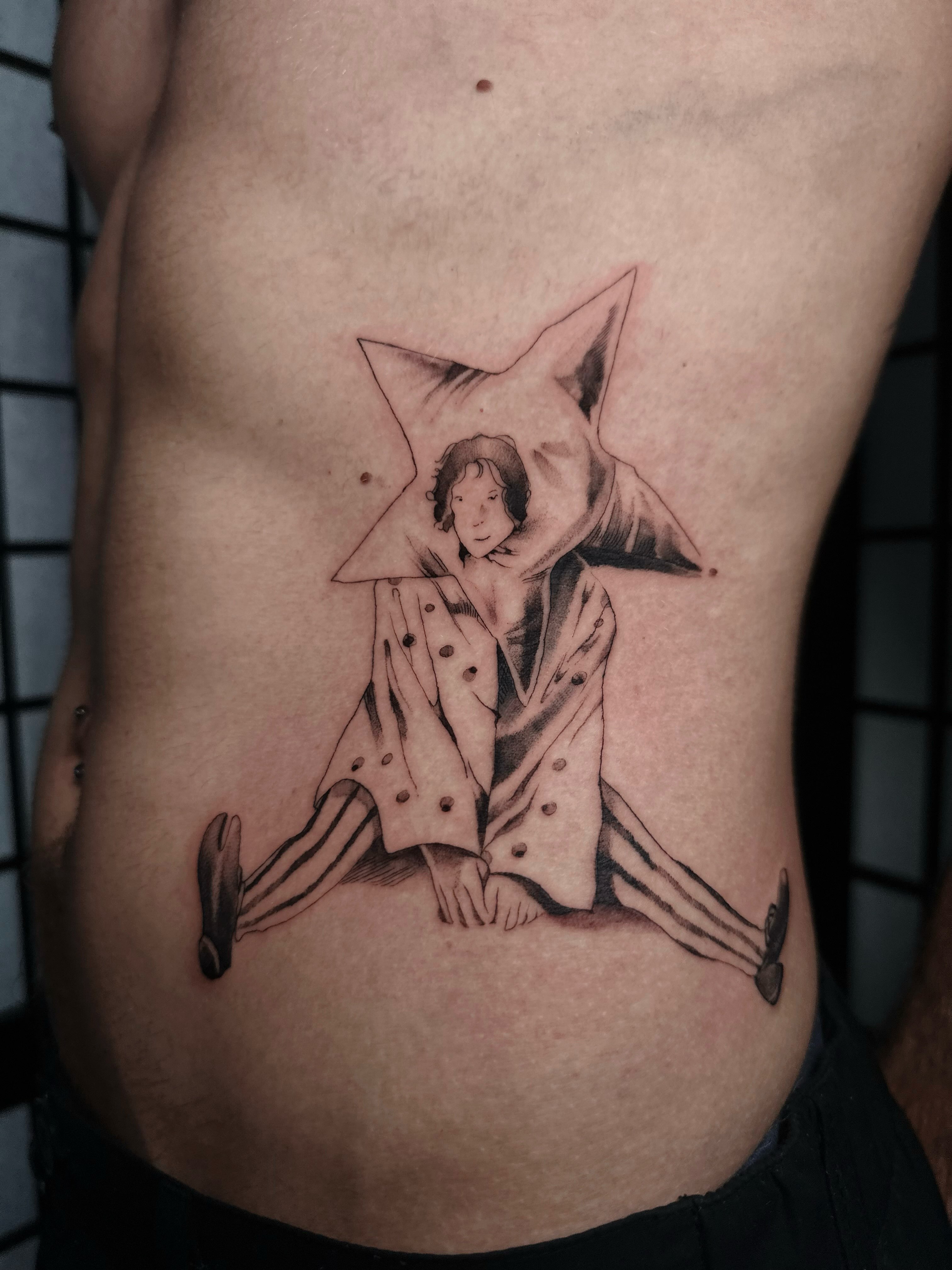 Star-Framed Figure in Split Coat